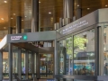 Within the arcade, an entry to the subway and a diminutive branch of the New York Public Library.