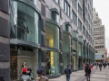 Bowed double-height storefronts face Lexington Avenue.